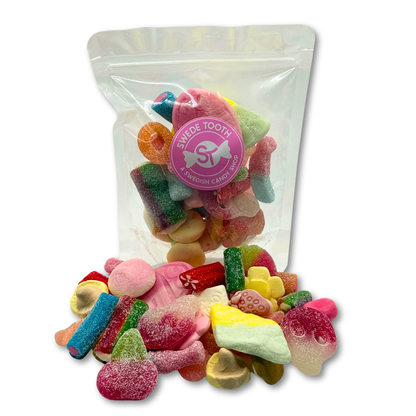 Sweet and sour Swedish candy mix in a clear resealable bag with assorted gummies and foam candies